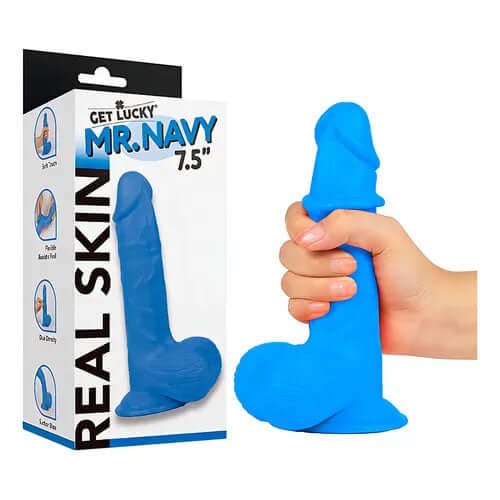 Real Skin Mr Navy 7.5 inches Dual Layer Dildo displayed with packaging and held in hand.