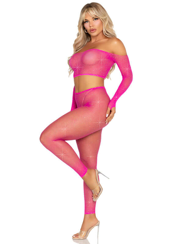 Leg Avenue neon pink rhinestone fishnet crop top and footless tights on model, stylish and vibrant outfit.