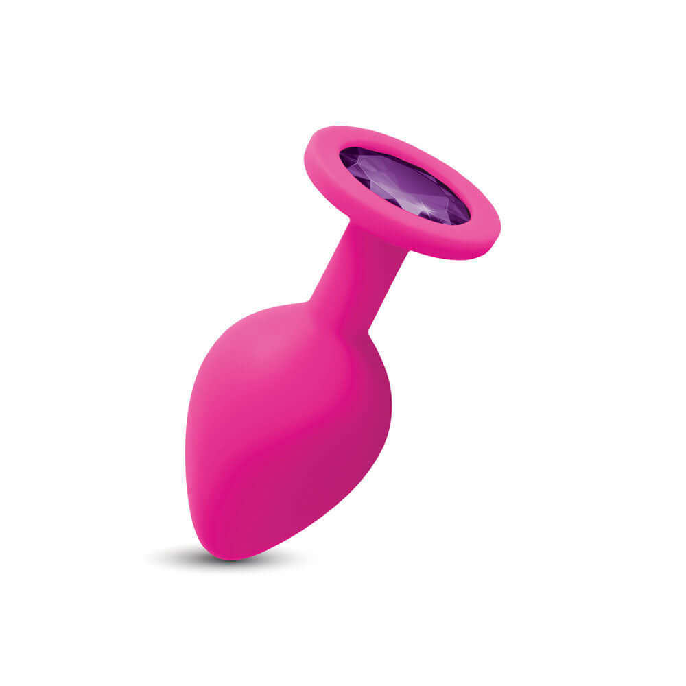 Gemma Purple Gem Pink Silicone Plug Medium featuring a vibrant pink silicone body and a purple gem on top.