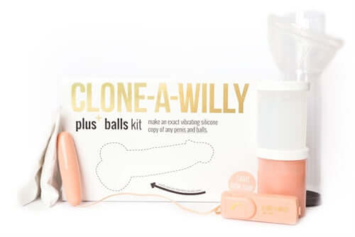Clone a Willy Plus Balls Kit Light Skin Tone with casting materials and vibrating device on display.