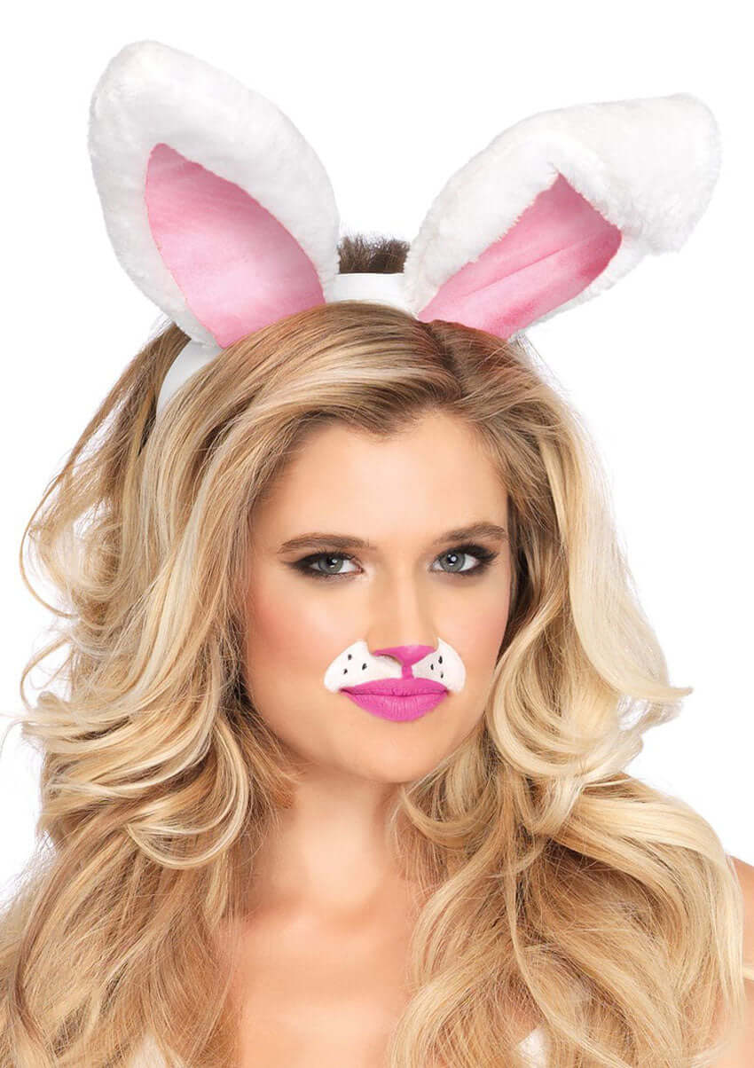 Leg Avenue Plush Bunny Rabbit Ears Headband White worn by a woman with playful bunny makeup for costume events.