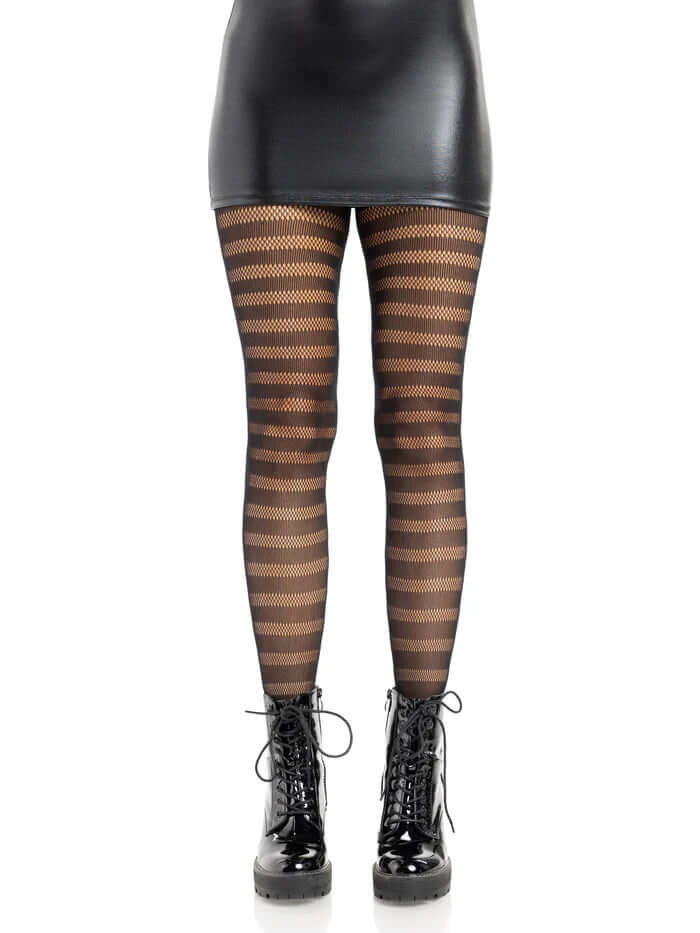 Leg Avenue Cosima Striped Net Tights OS Black worn with a black leather skirt and lace-up boots.