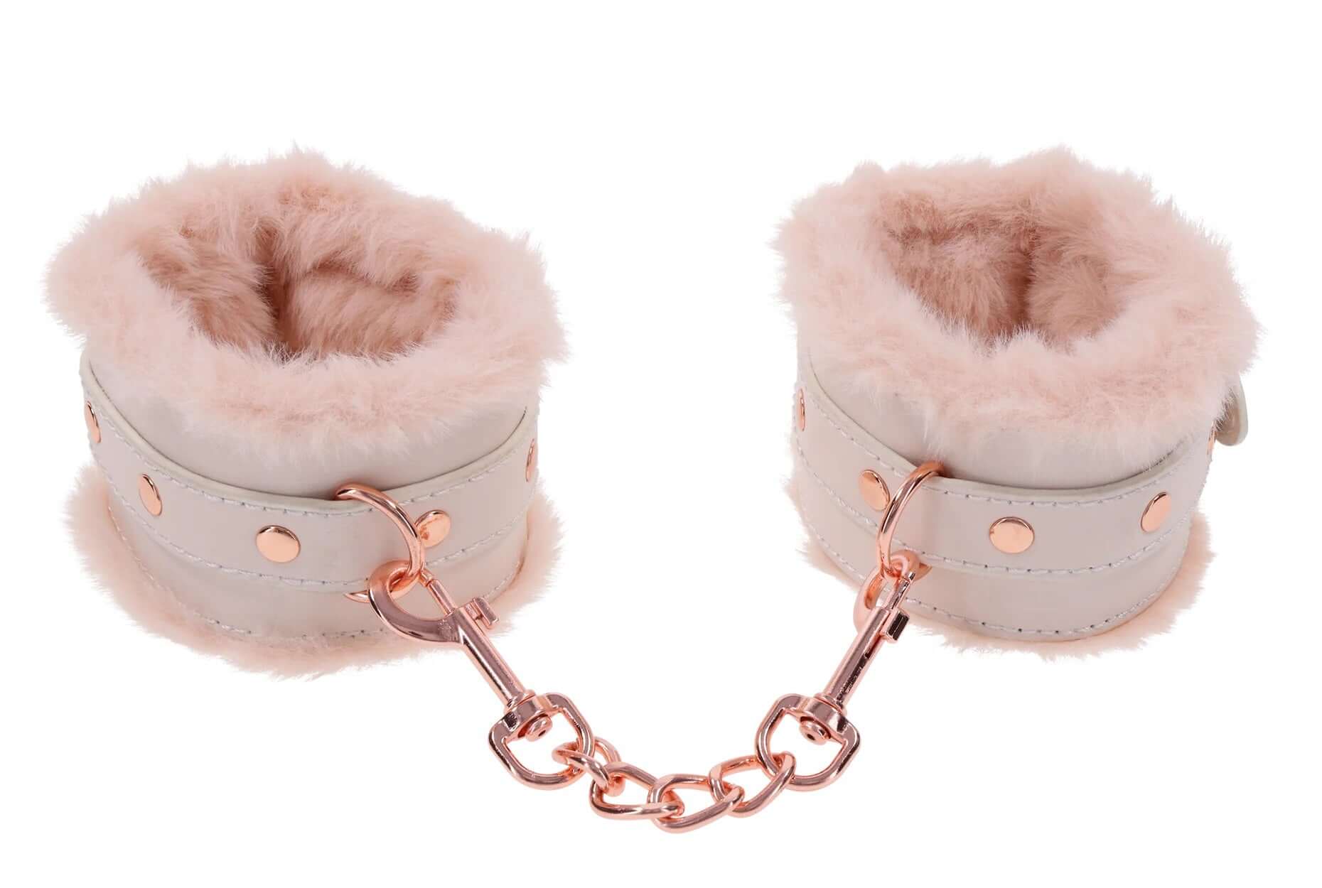 Pink faux fur handcuffs with light peach color and rose gold chain for playful pleasure and intimate moments - Peaches ‘N Creame Fur Handcuffs