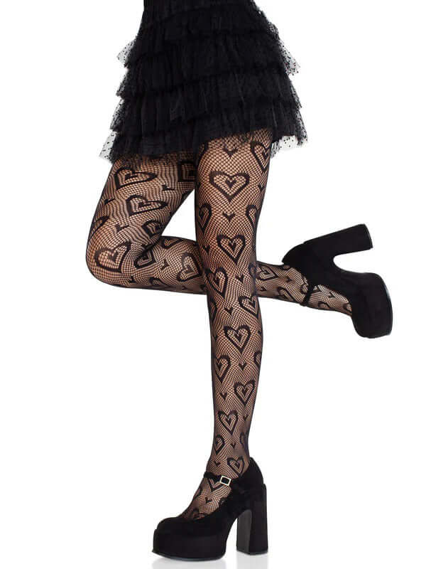 Leg Avenue heart net tights in black, featuring a flirty double heart design, paired with stylish black platform shoes.