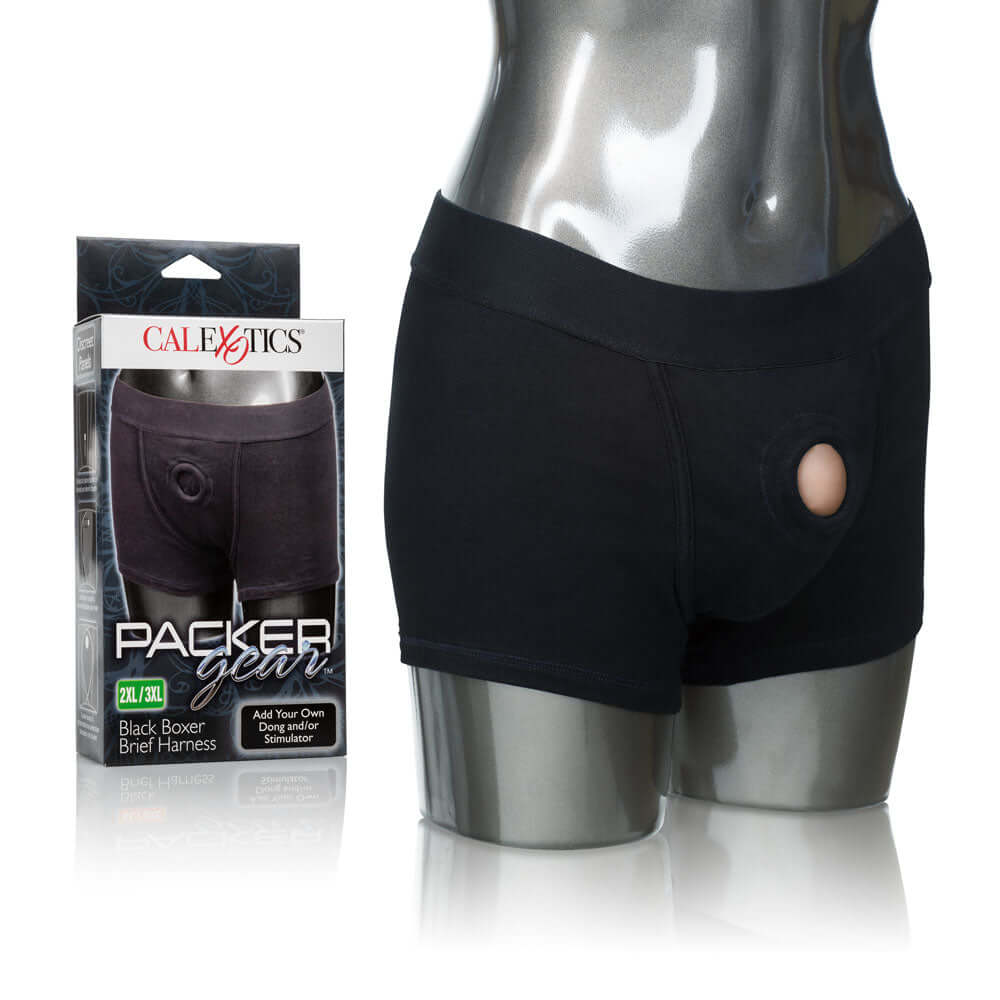 Packer Gear Black Boxer Brief Harness 2XL 3XL displayed on a mannequin with packaging, showcasing its style and support.