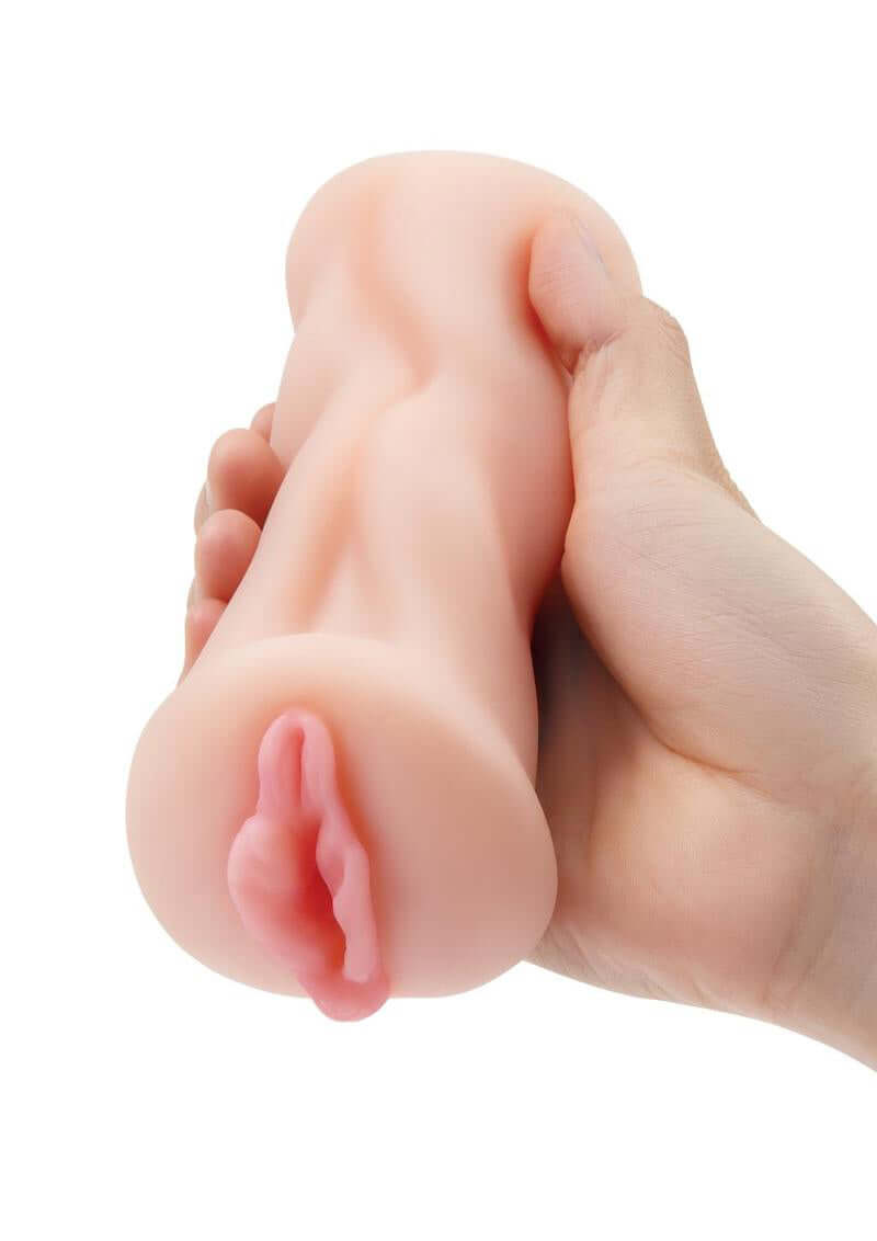 Hand holding ZOLO ultra-realistic Asian stroker with lifelike texture for enhanced pleasure and realistic sensations