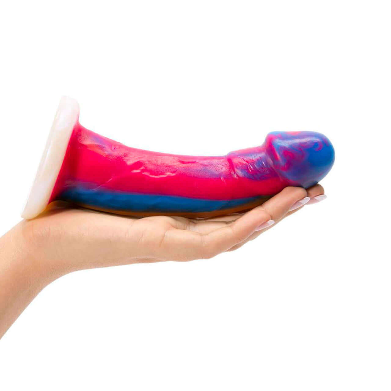 Woman holding Mustang Vixskin Dildo Tie Bright with realistic texture and flat base for solo or harness use.