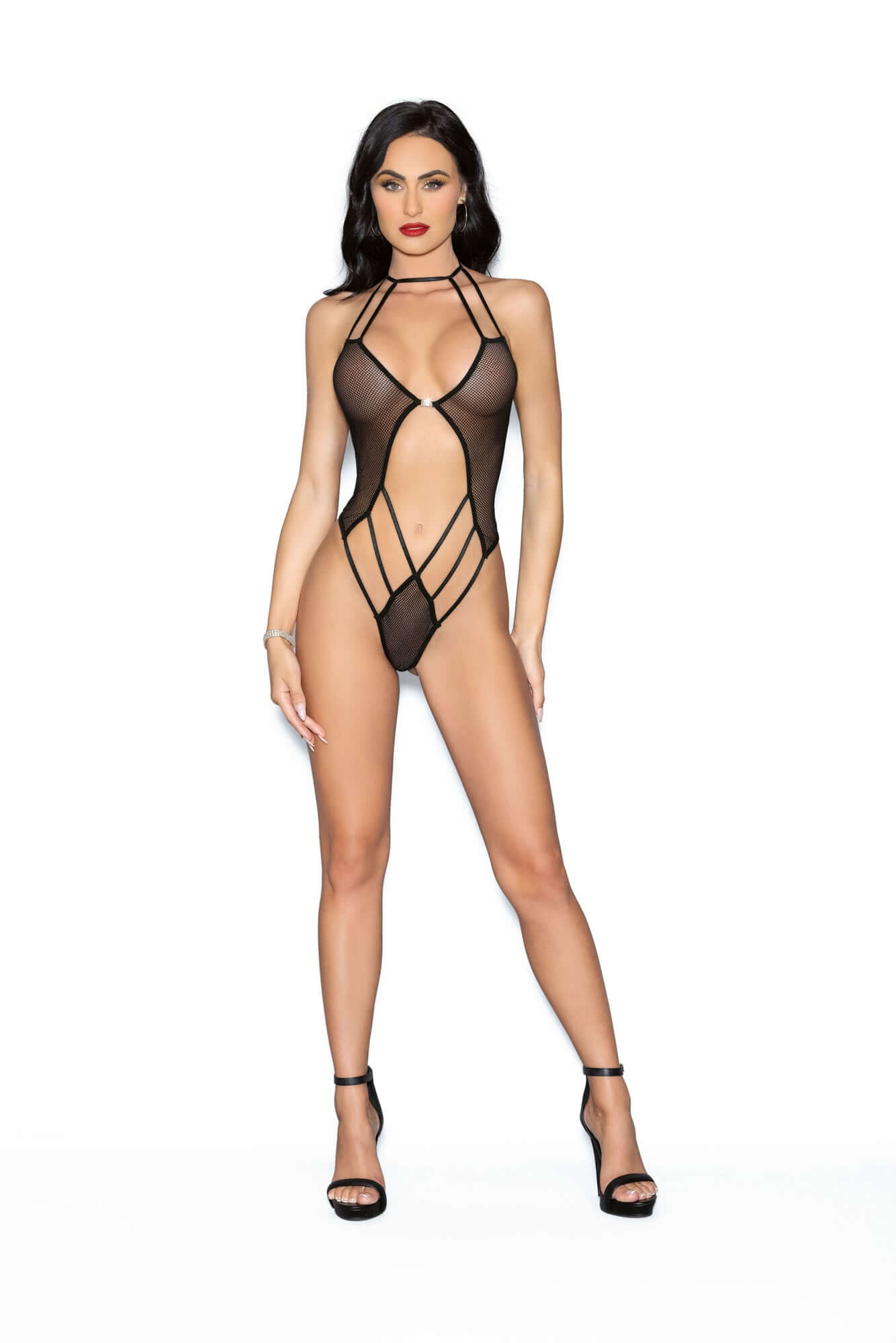 Woman wearing Jeweled Front Back Teddy in black, fishnet halter tie design with polyamide and elastane material. One size fits most, 90-160 lbs.