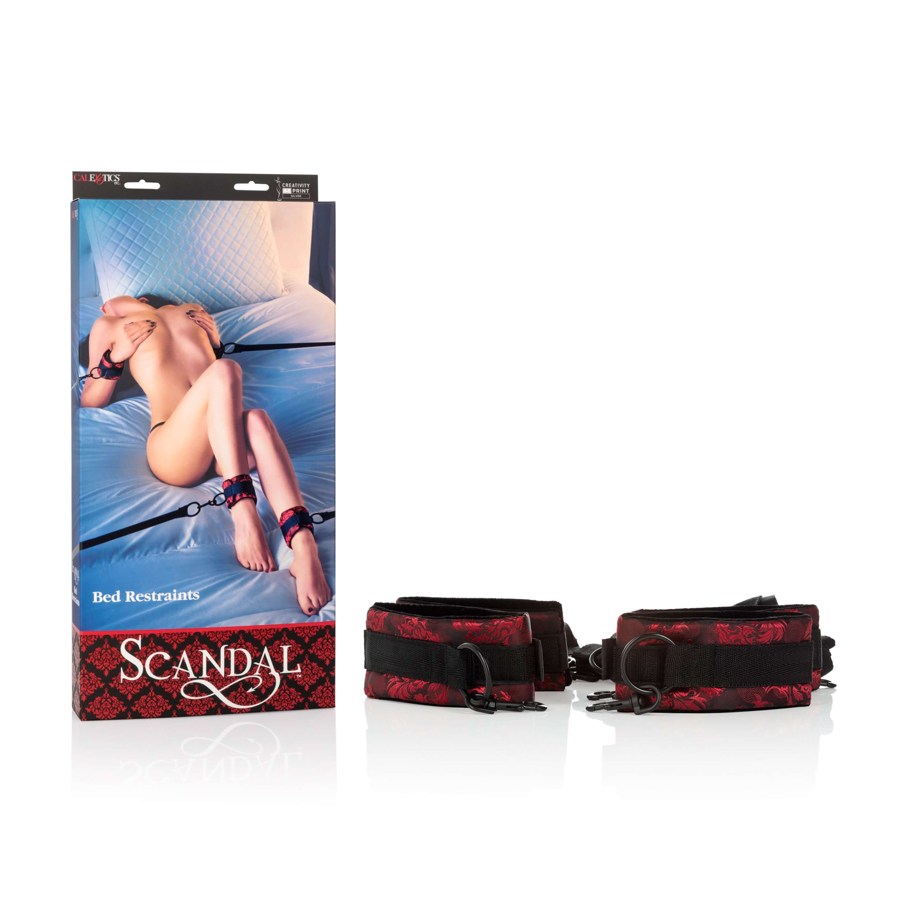 Scandal Bed Restraints packaging and restraints displayed, designed for enhancing sensation and controlled positioning.