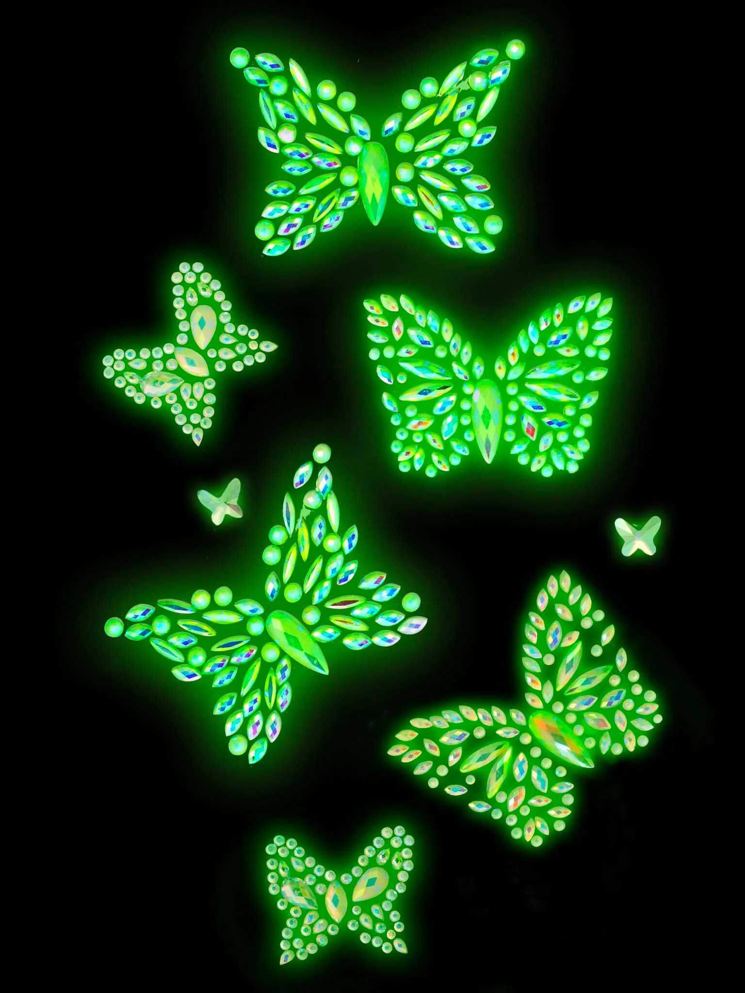 Glow-in-the-dark butterfly body jewels by Leg Avenue in green, perfect for festival outfits and summer looks.