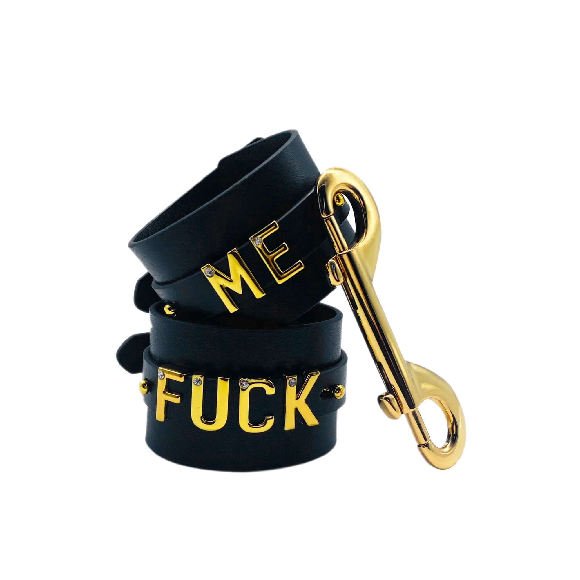 Luxury Italian leather handcuffs with gold-plated lettering and double carabiner for stylish restraint.