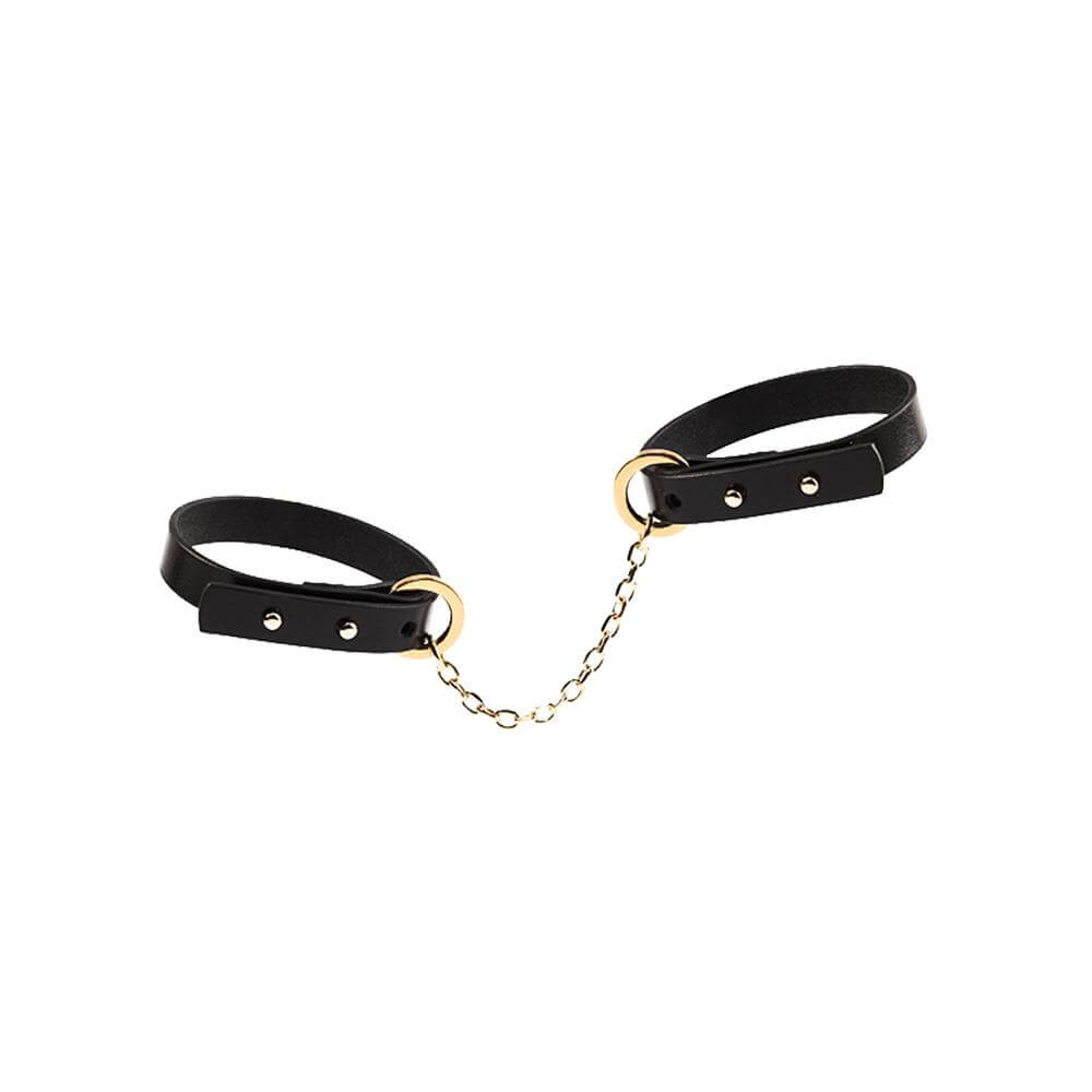 UPKO Luxury Italian leather thin handcuff bracelets in black with adjustable buckles and chain connector. Exquisite and elegant design.