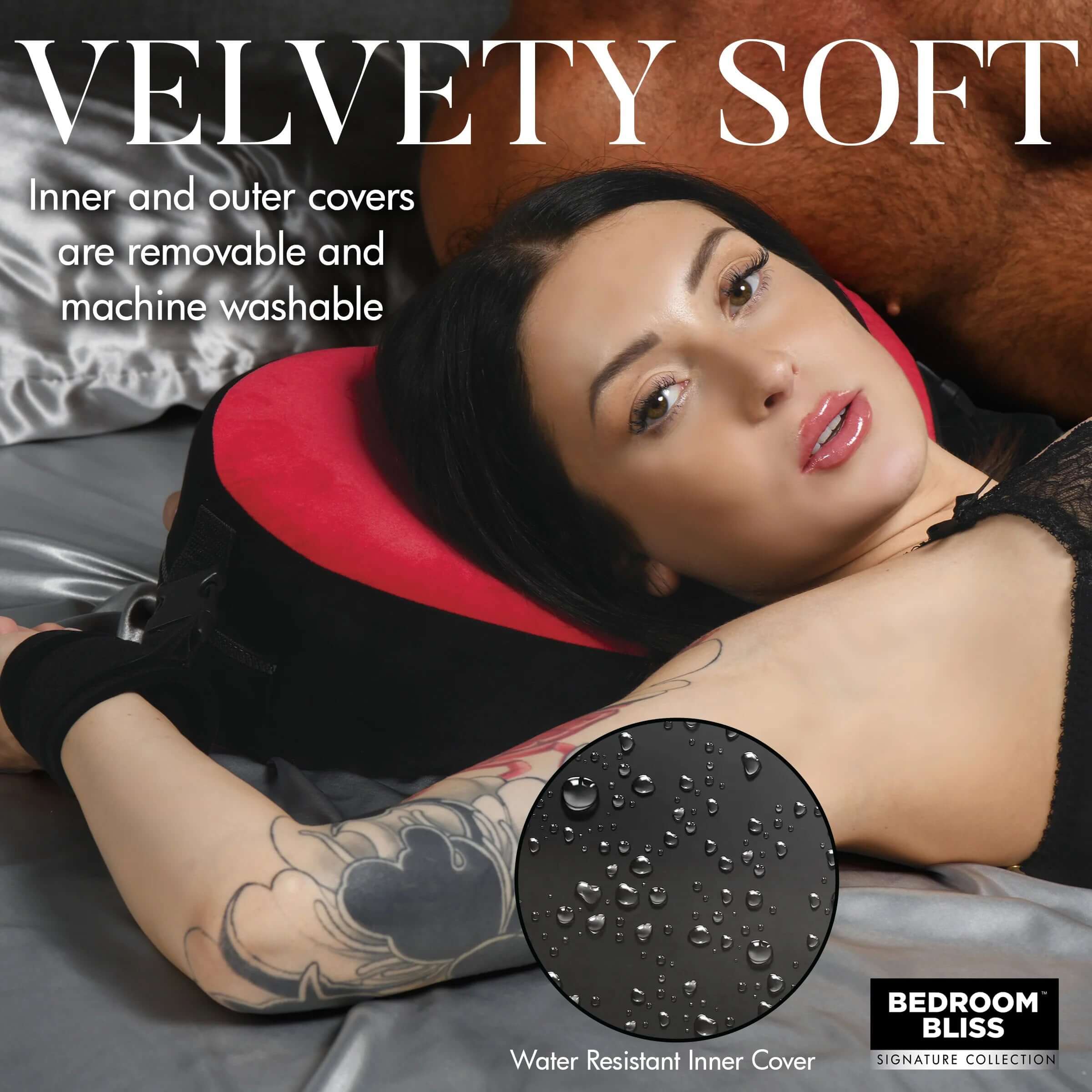 Velvety soft Bondage Love Pillow in black and red with a heart shape, featuring machine washable covers and a water-resistant inner layer.