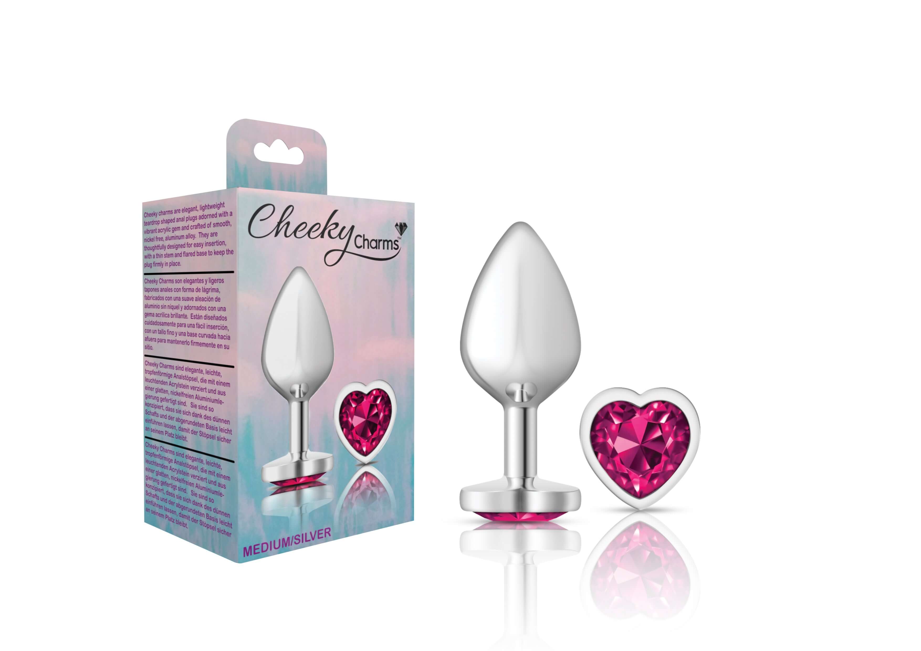 Cheeky Charms medium silver metal butt plug with bright pink heart-shaped gemstone, shown with packaging.