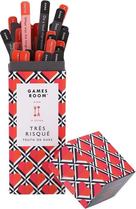 Tre Risque Truth Or Dare Game box with challenge sticks for couples' party fun.