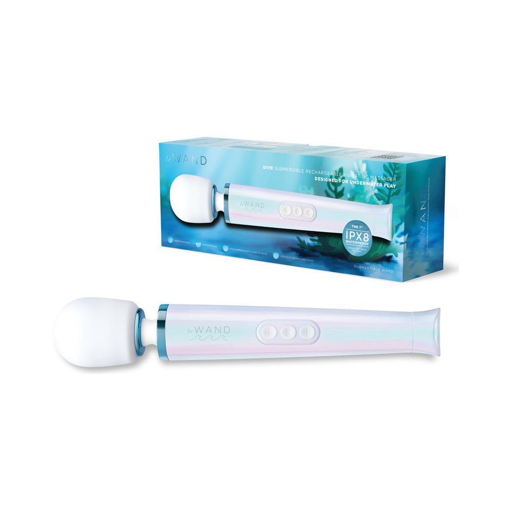 Le Wand Dive Submersible Vibrating Massager Seashell with packaging on a blue background, designed for deep pleasure.