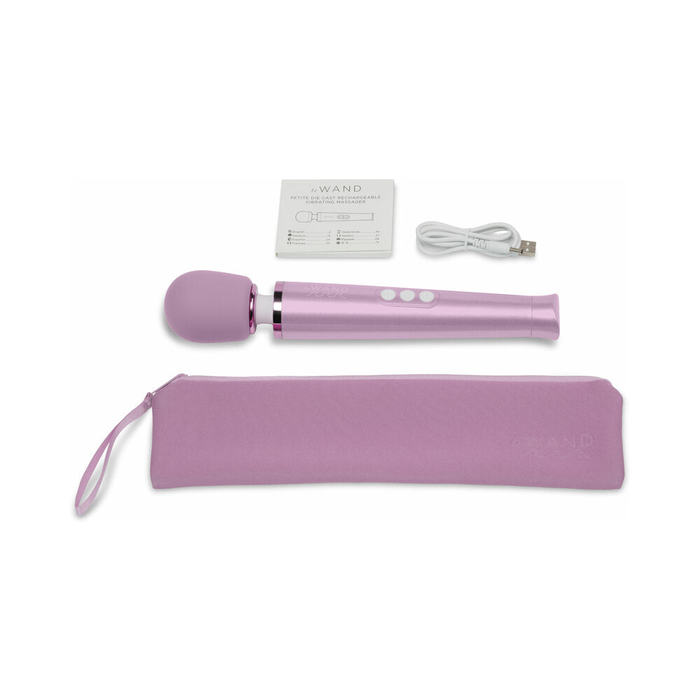 Le Wand Dive Submersible Vibrating Massager Lavender with accessories, charging cable, and storage pouch.