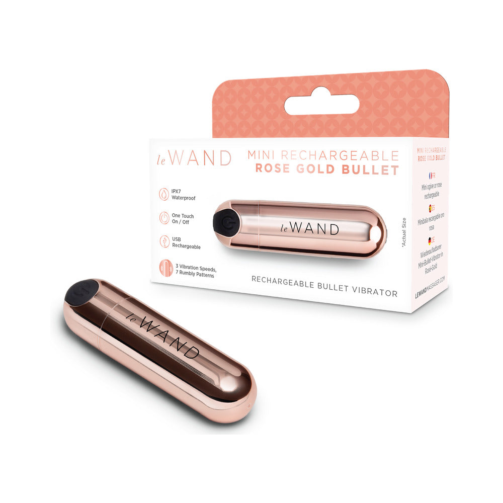 Le Wand Essentials Mini Rose Gold Bullet Vibrator with packaging showcasing features and elegant design.