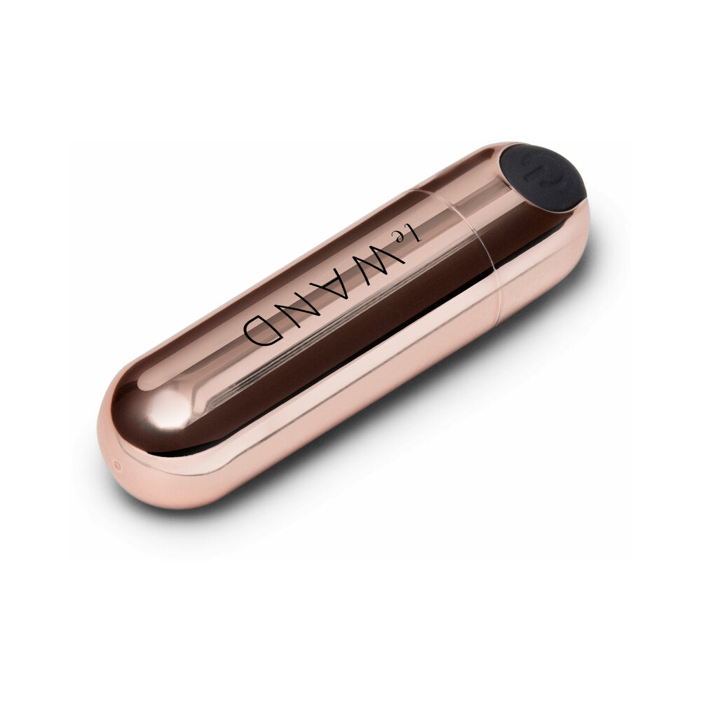 Le Wand Essentials Mini Rose Gold Bullet Vibrator in elegant design for targeted clitoral stimulation.