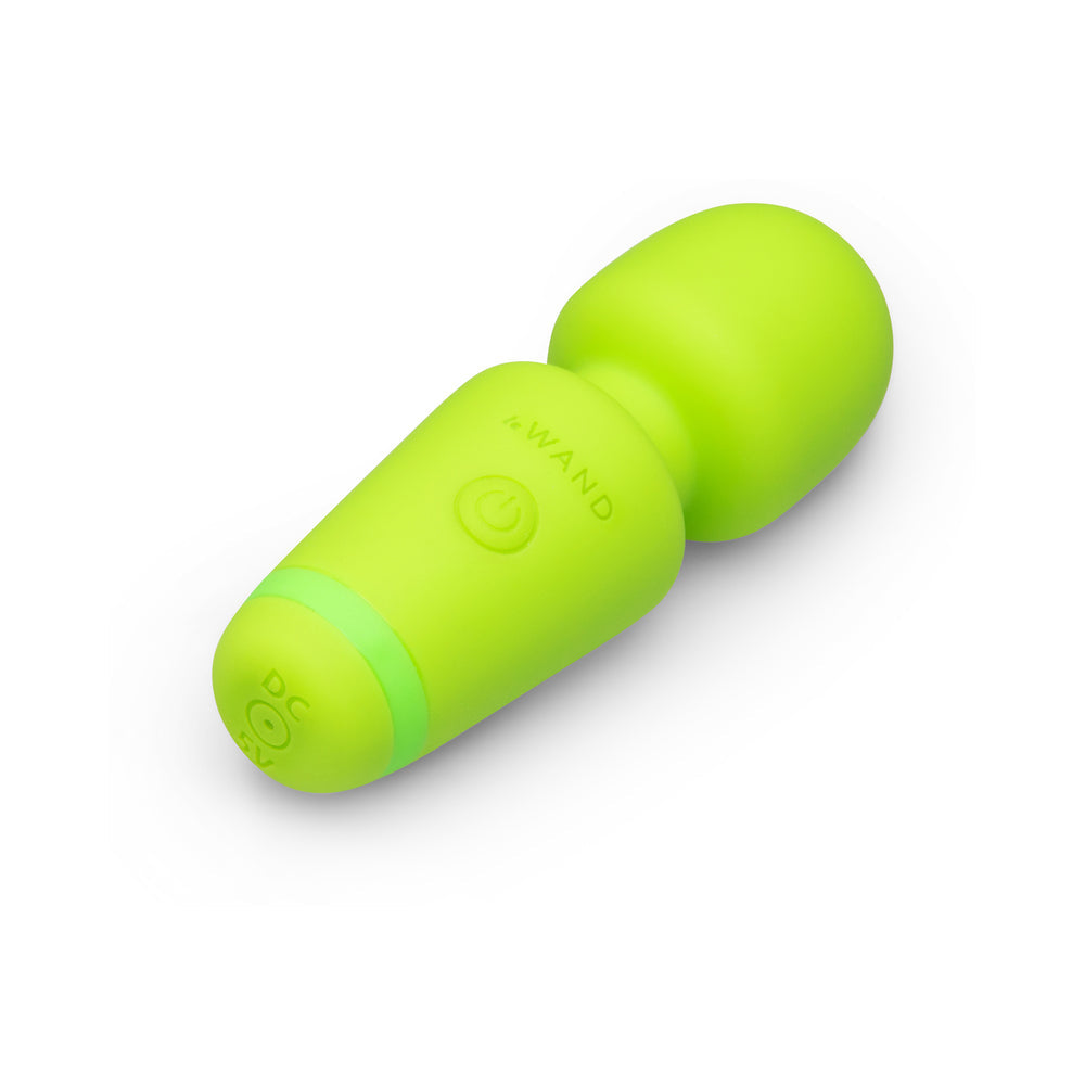 Le Wand Essentials Mini Wand Vibe Pocket-sized Vibrator in vibrant green color, compact design for portability.