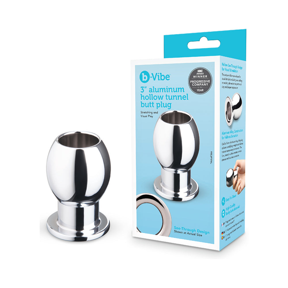 b-Vibe Essentials 3 Inch Aluminum Hollow Tunnel Butt Plug displayed with packaging for anal play and comfort.