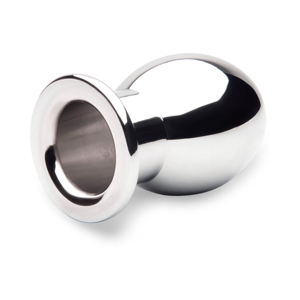 b-Vibe Essentials 3 Inch Aluminum Hollow Tunnel Butt Plug features a shiny metal design with a hollow tunnel opening for comfort.