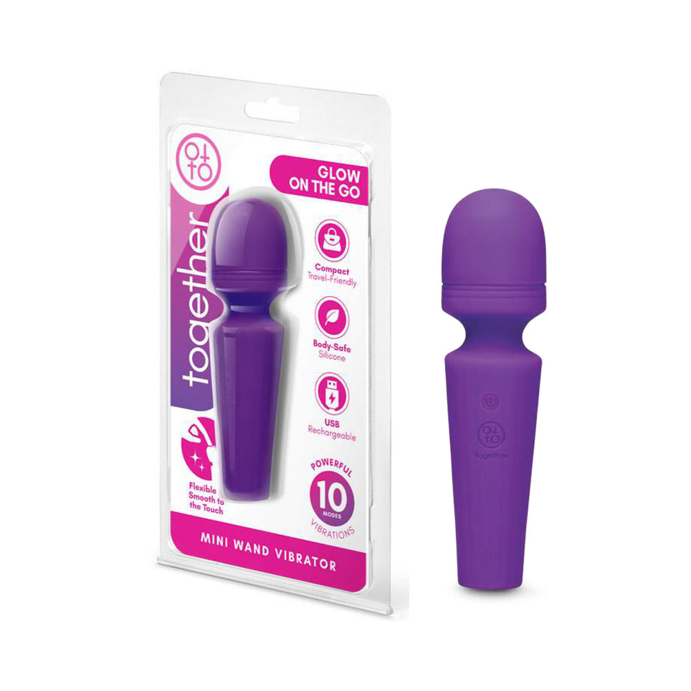 Together Glow On The Go Mini Wand Vibrator in packaging showcasing its compact and travel-friendly design.