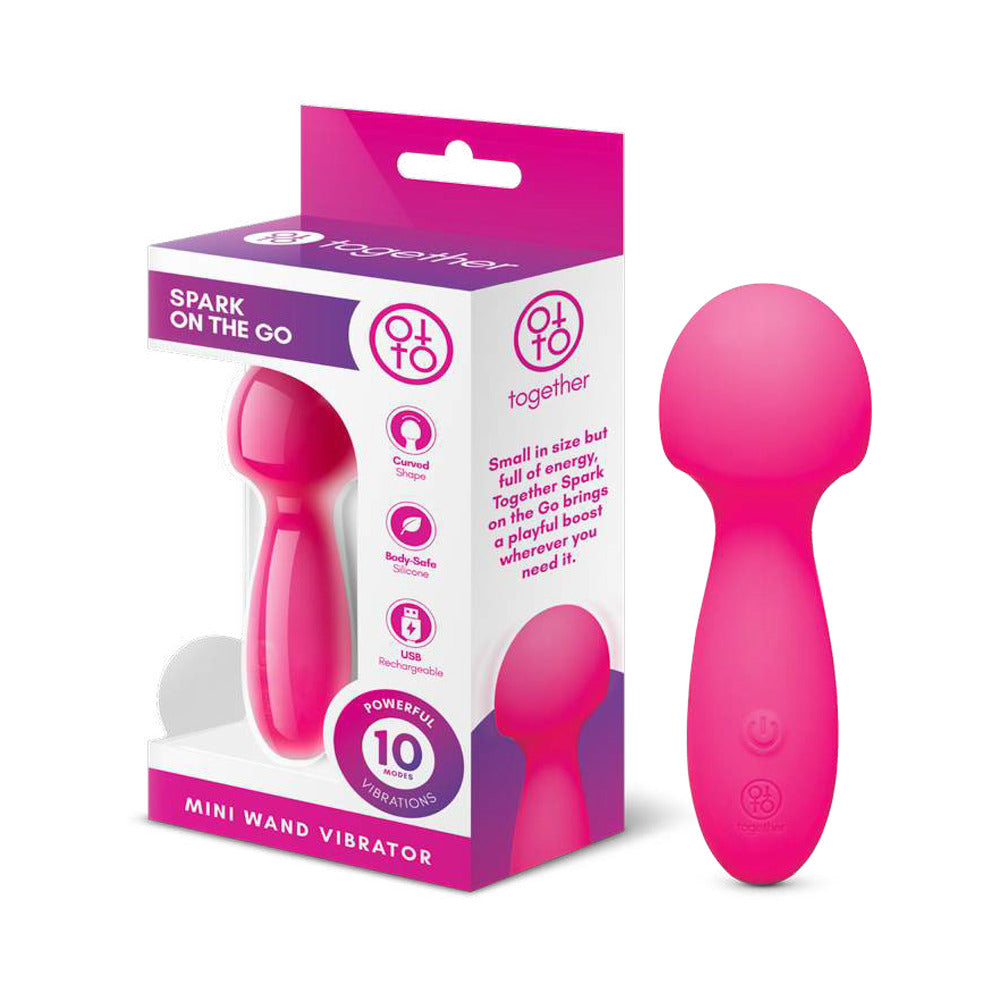 Together Spark On The Go Mini Wand Vibrator in pink packaging with features and product description.