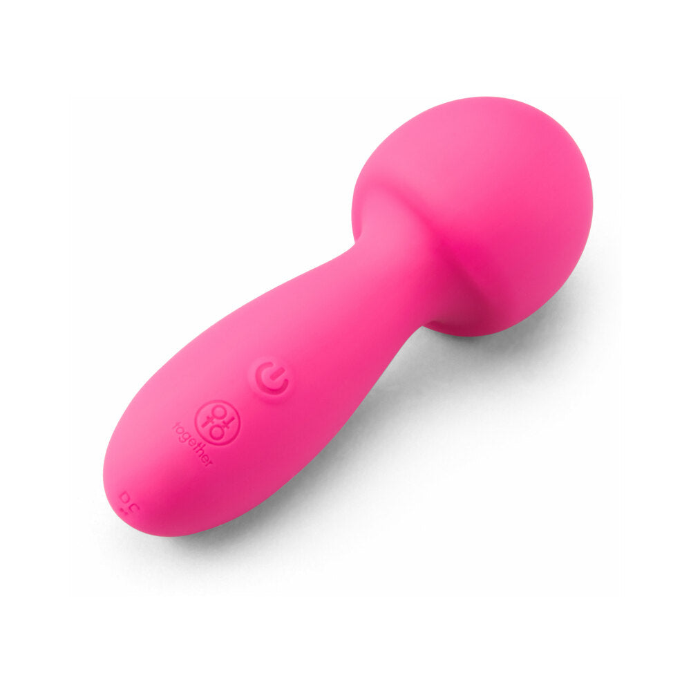 Together Spark On The Go Mini Wand Vibrator in vibrant pink color, compact design for versatile pleasure.