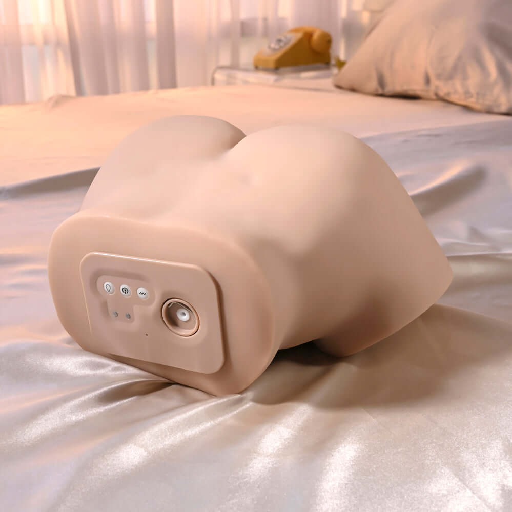 Squirt for Me Sasha Grey Movie & Realistic Squirting Stroker showing realistic design and control features on a bed.