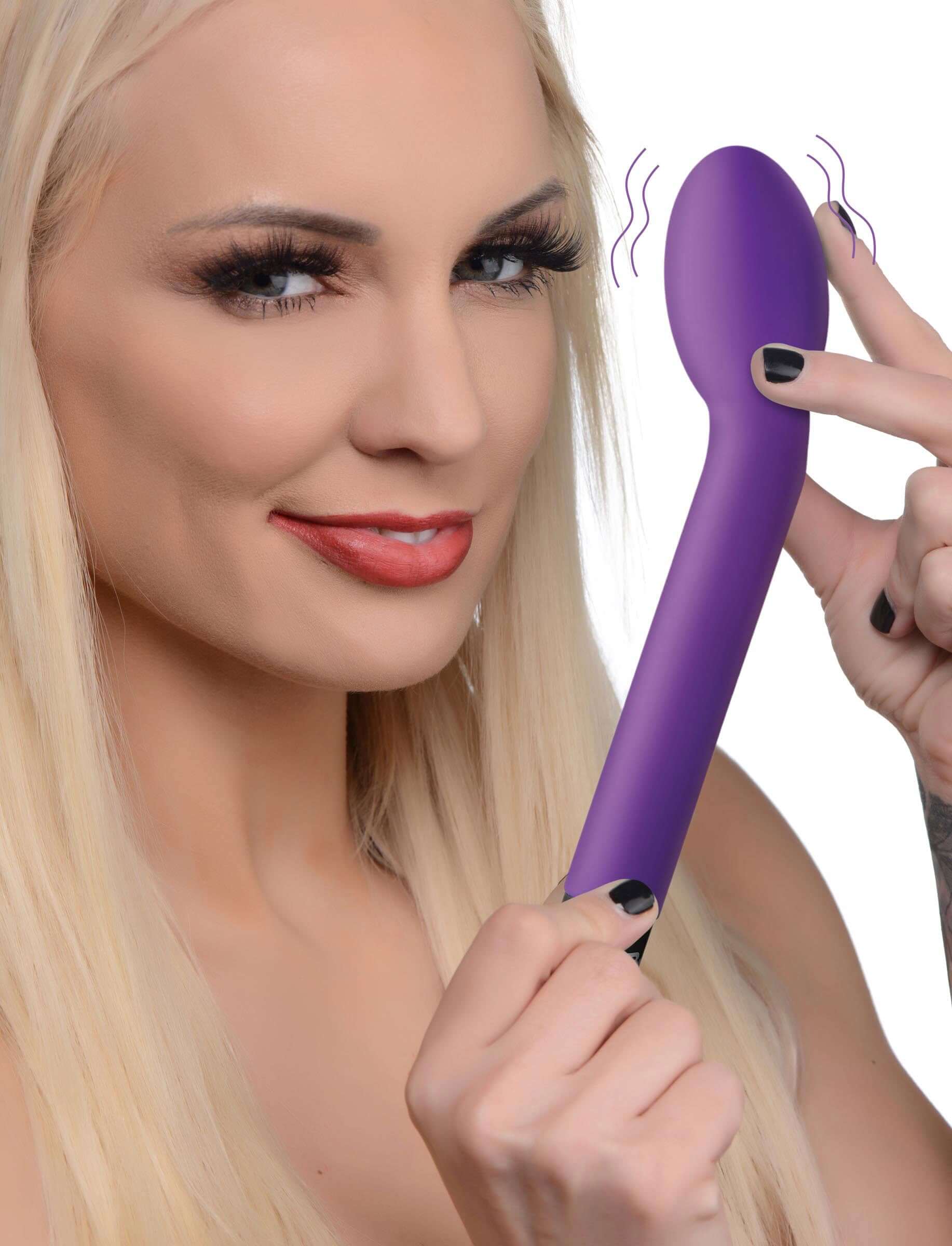 Bang 10X Rechargeable Silicone G-Spot Vibrator Purple held by a smiling woman showcasing its features.
