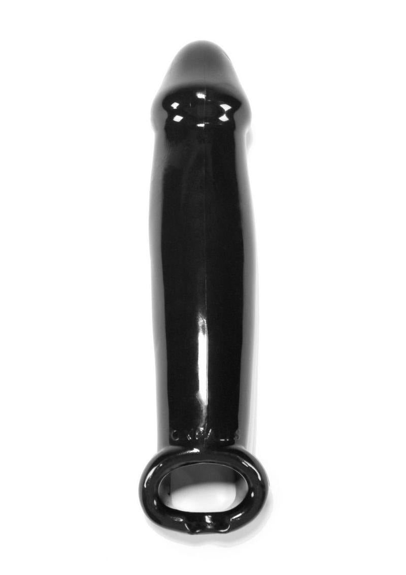 Oxballs Muscle Textured Cock Sheath Penis Extender Black on a white background, showcasing its sleek design.