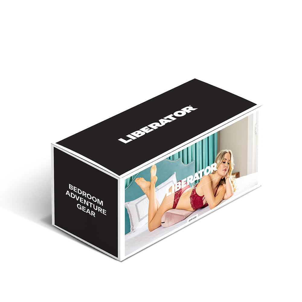 Liberator Jaz Original Rose Sex Positioning Pillow packaging with model demonstrating its use in a bedroom setting.