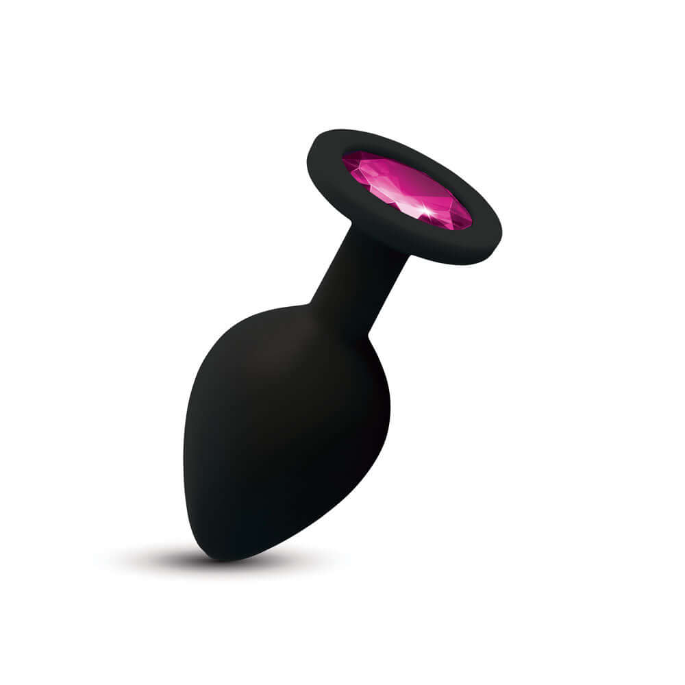 Gemma Pink Gem Black Silicone Plug Medium featuring sleek black silicone and a sparkling pink gem.
