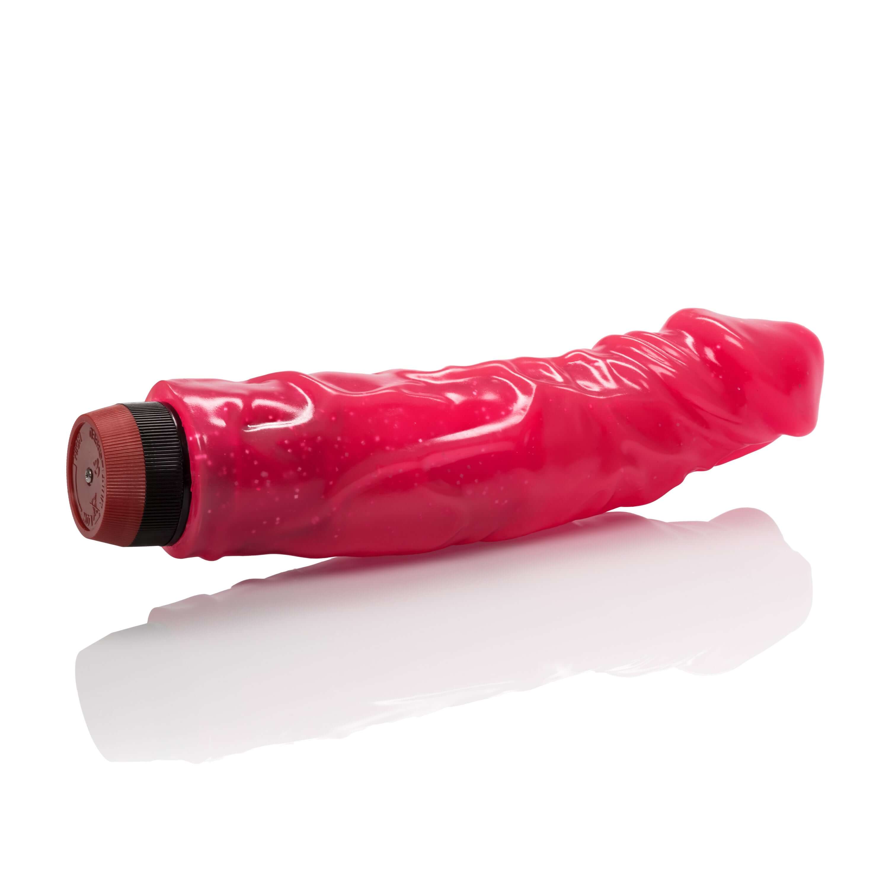 Devil Dick 8.5 Inches Vibrator Hot Pink on a reflective surface, showcasing its vibrant color and flexible design.