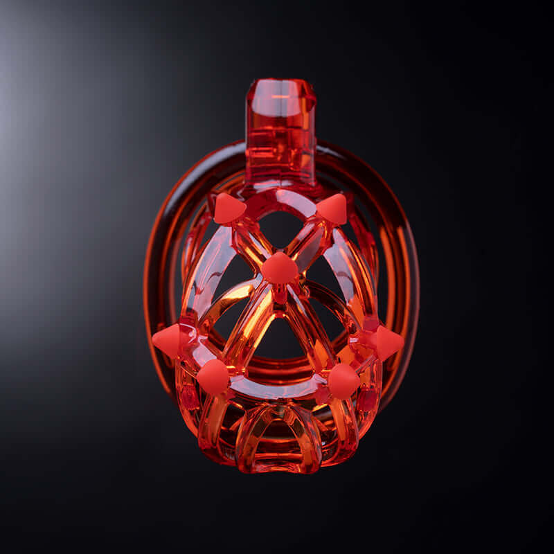 UPKO Caged Beast Male Chastity Device Kit in striking orange, showcasing intricate design and modern aesthetics.