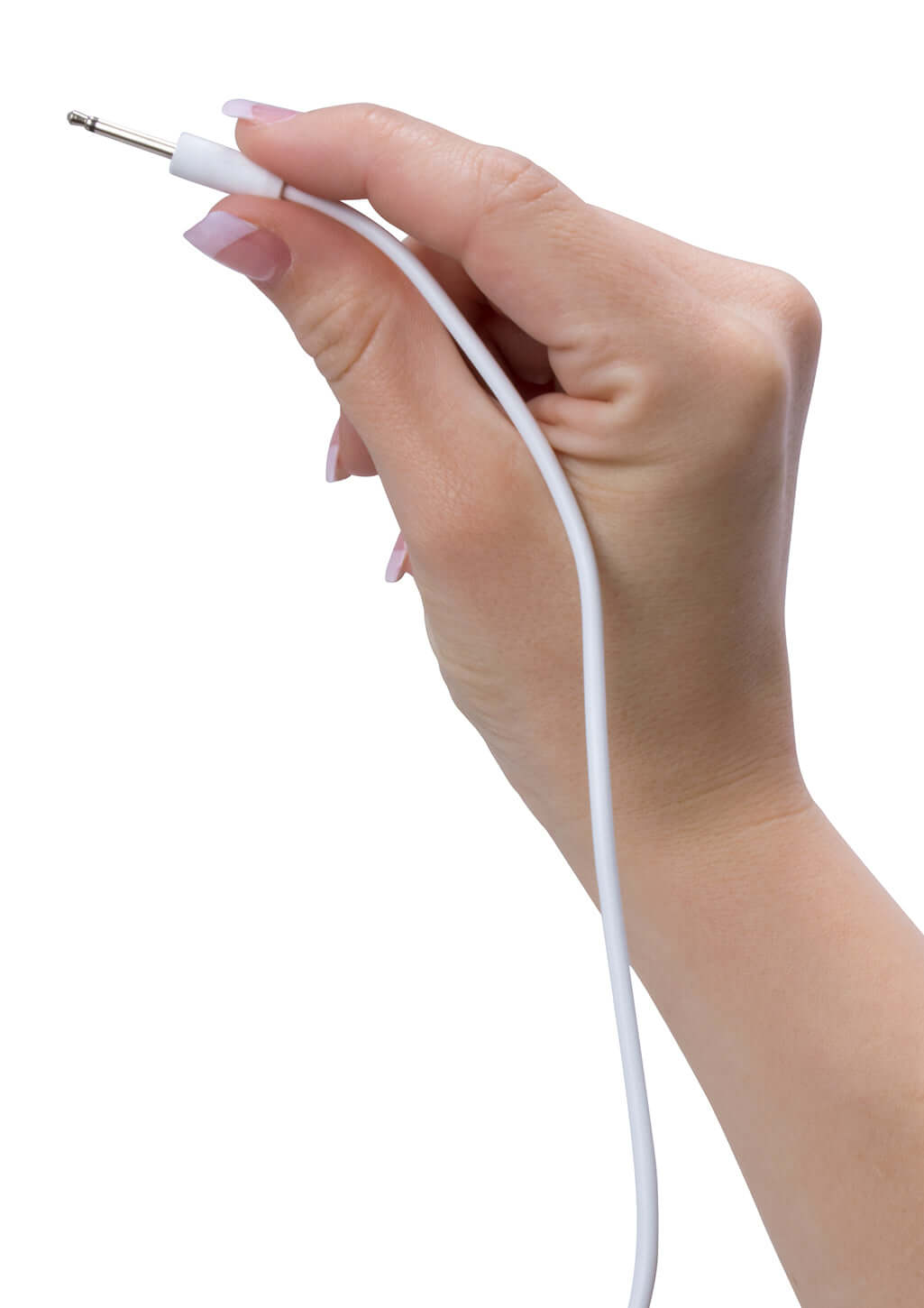 A hand holding the plug of a Screaming O Recharge Charging Cable ready for connection.