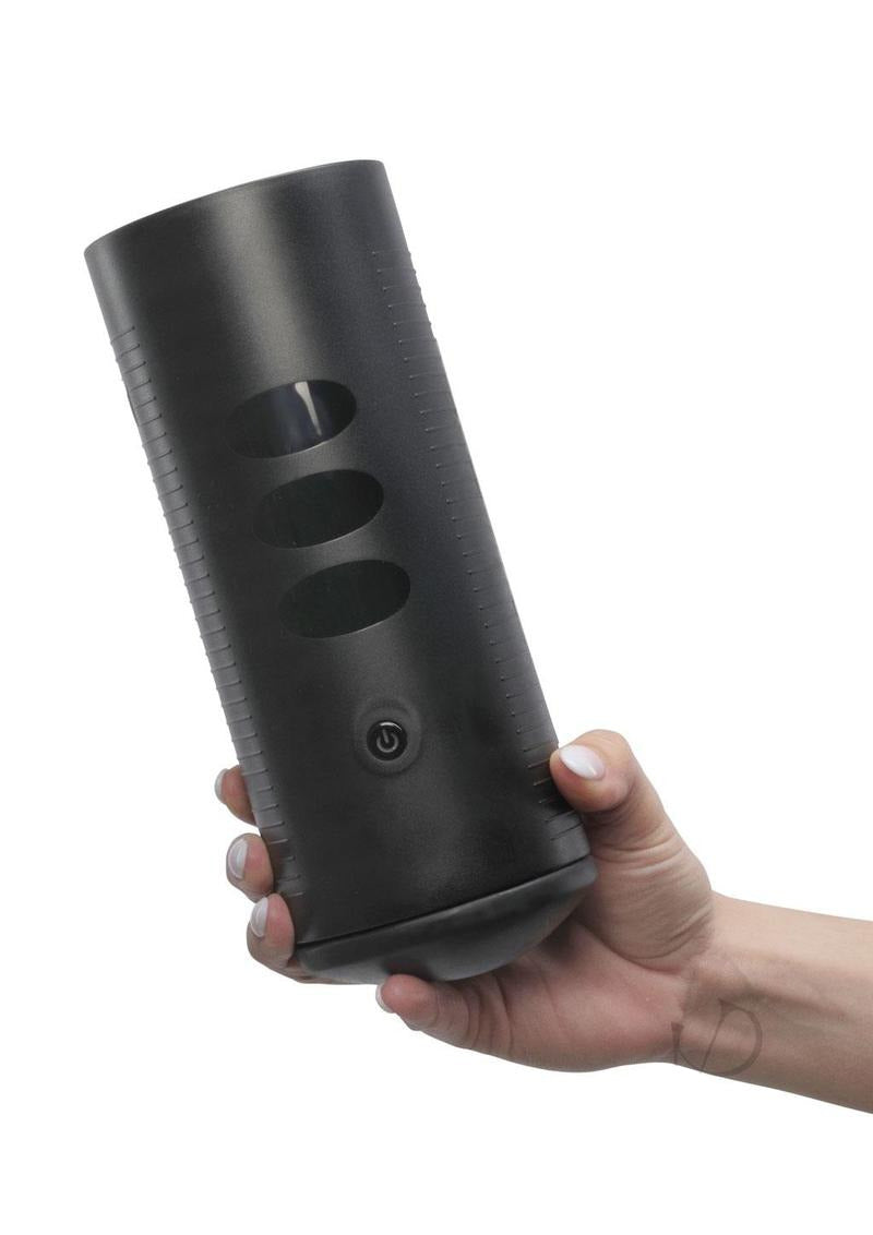 Kiiroo Titan Interactive Vibrating Masturbator held in hand, showcasing its sleek design and interactive features.