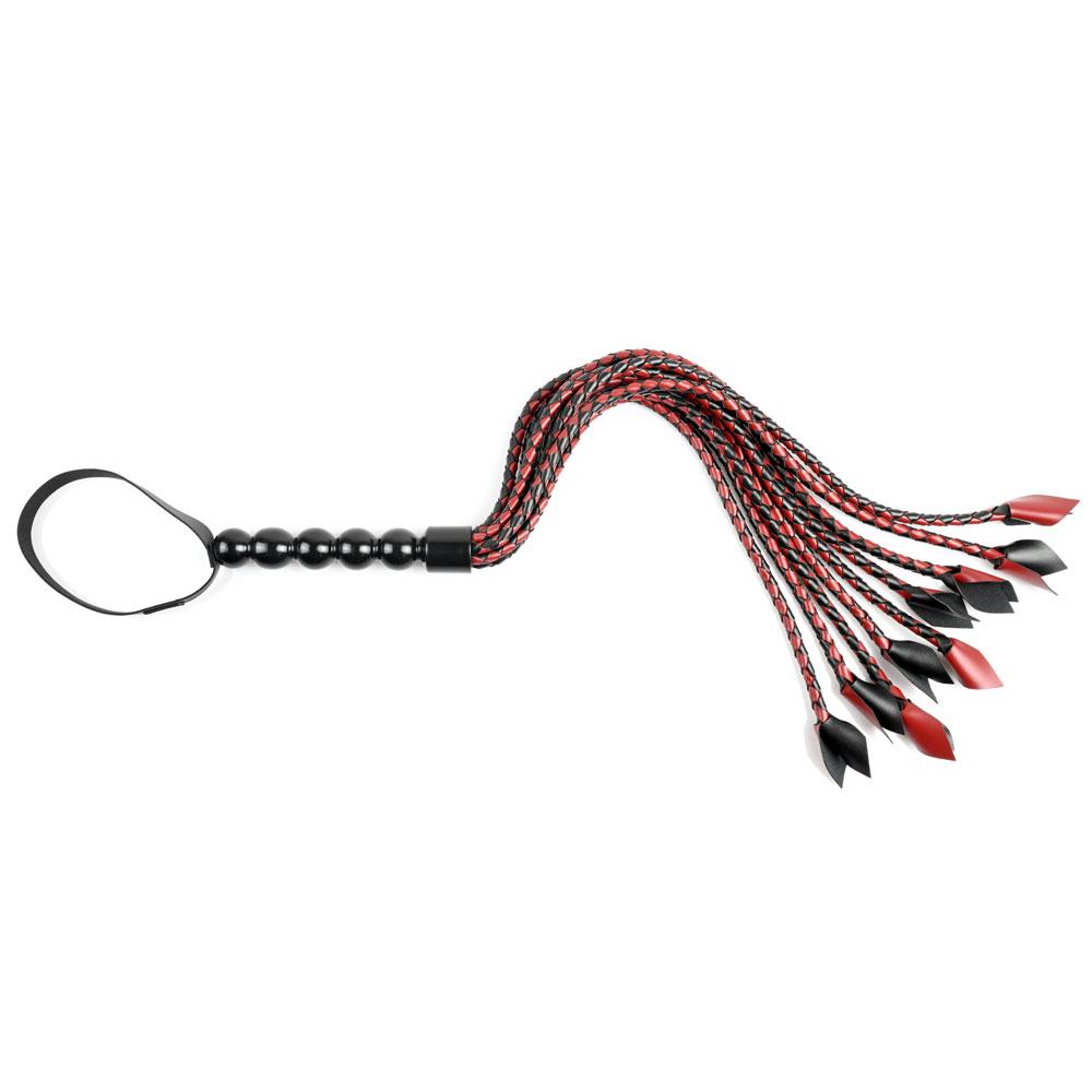 Saffron Braided Flogger featuring thick braided falls and riding crop-style tips for precise impact sensation.