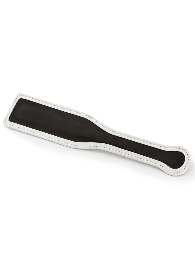GLO Bondage Glow In The Dark Paddle Green, black paddle with white stitching for impact play, showcasing glow-in-the-dark design.