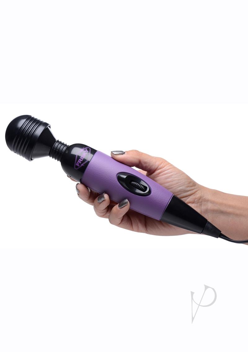 Frisky Playful Pleasure Plug In Wand Massager Purple held in hand, designed for relaxation and ease of use.