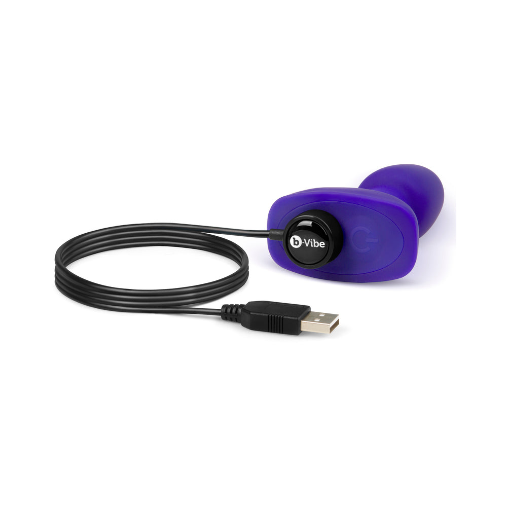 b-Vibe Rimming Petite Rotating Remote Control Plug Purple with USB charging cable for pleasurable experiences.