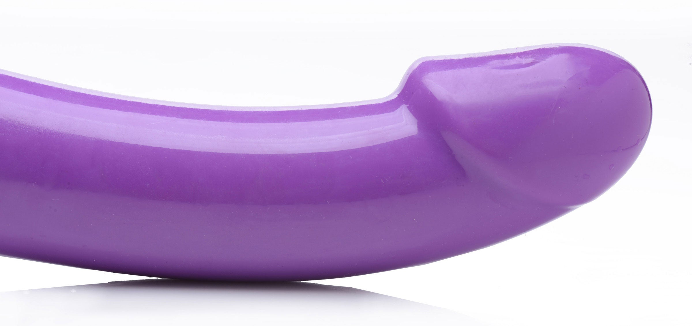 Strap U 7X Revolver Thick Vibrating Strapless Strap-On Dildo Purple close-up view of the ergonomic design.