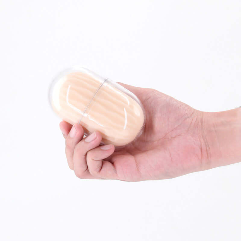 Pocket Pals Handy Strokers Lexi White held in hand, showcasing its compact and discreet design for pleasure.