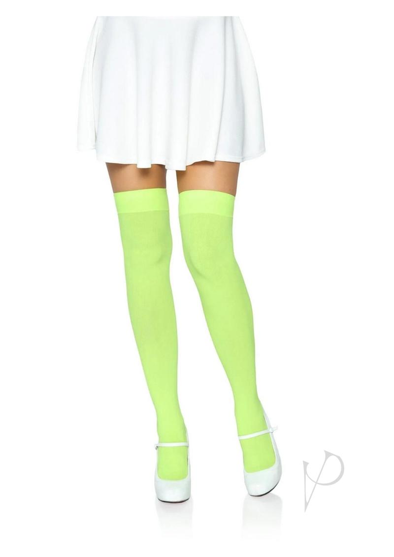 Leg Avenue Nylon Over The Knee Socks One Size Neon Green worn with a white skirt and heels.