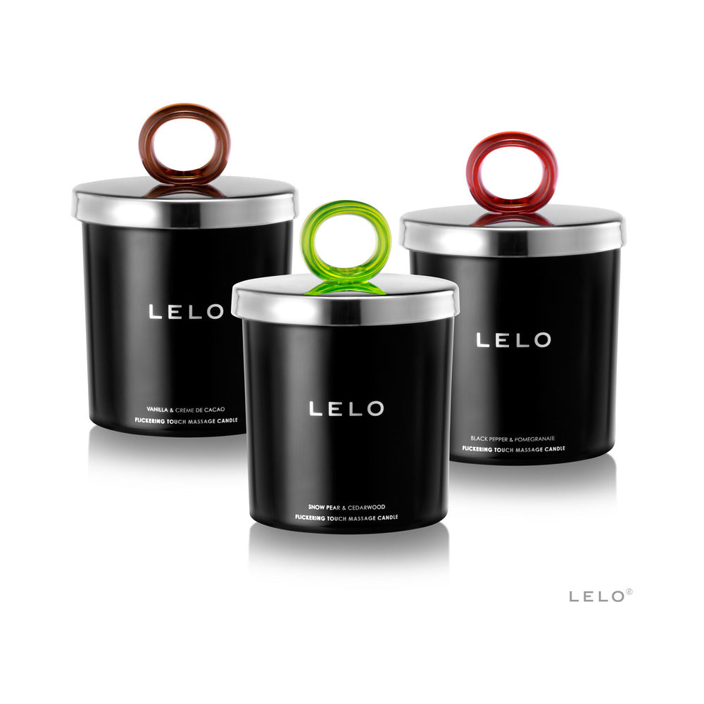 Lelo Massage Candle Black Pepper & Pomegranate Scent among other Lelo massage candles in elegant packaging.