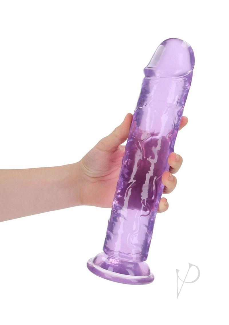 A person holding the RealRock Crystal Clear Straight Dildo 11 inch Purple showcasing its sleek design and transparent silicone.