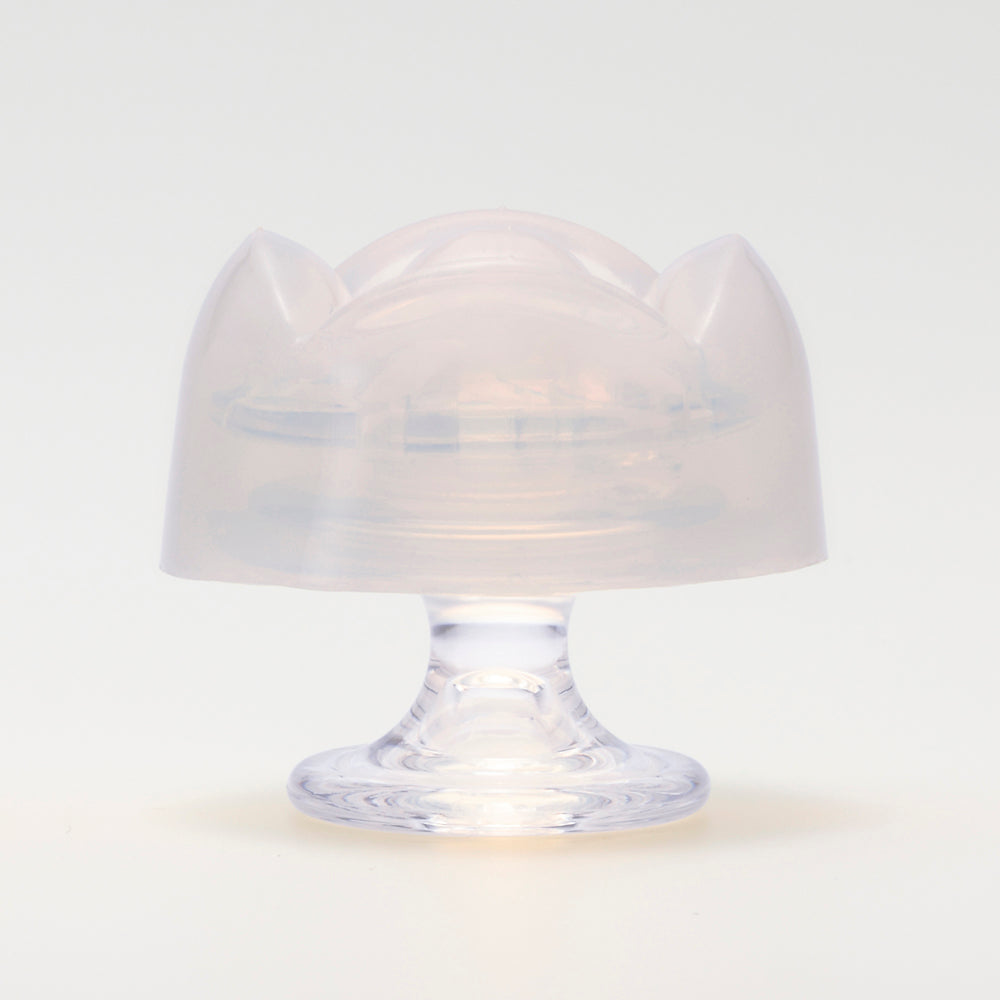 Iroha Petit Lily Disposable Clitoral Stimulator Clear showcasing its unique design for personal pleasure.