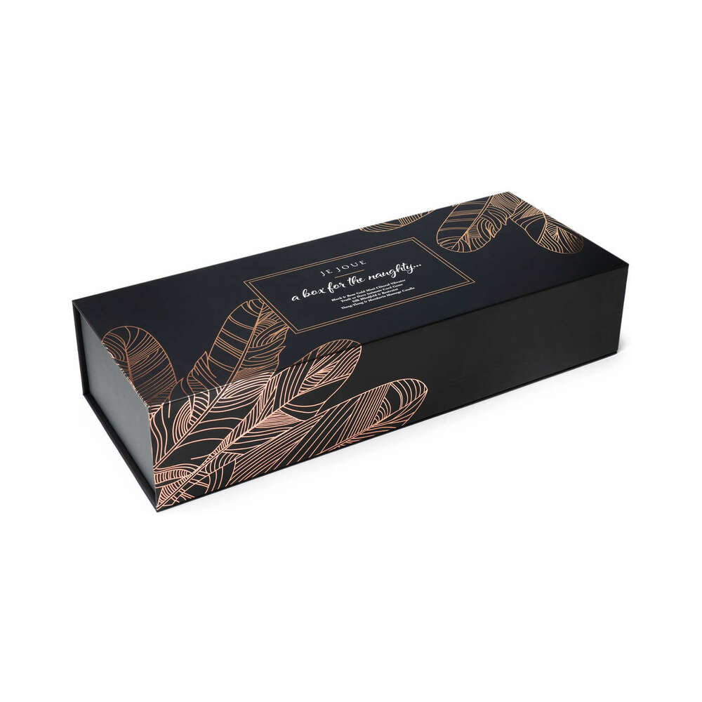 Je Joue The Naughty Collection 4-piece Gift Set beautifully packaged in a black box with rose gold feather design.