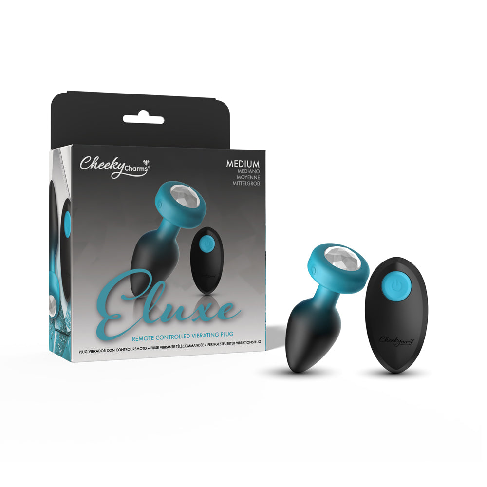 Cheeky Charms Eluxe Vibrating Anal Plug Medium in packaging with remote control, showcasing luxury and pleasure.